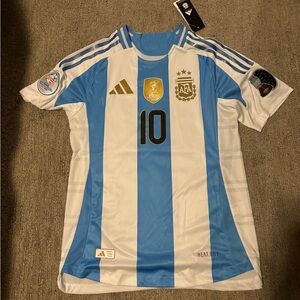 Authentic 2024 Lionel Messi Argentina Copa América jersey has both patches tags
